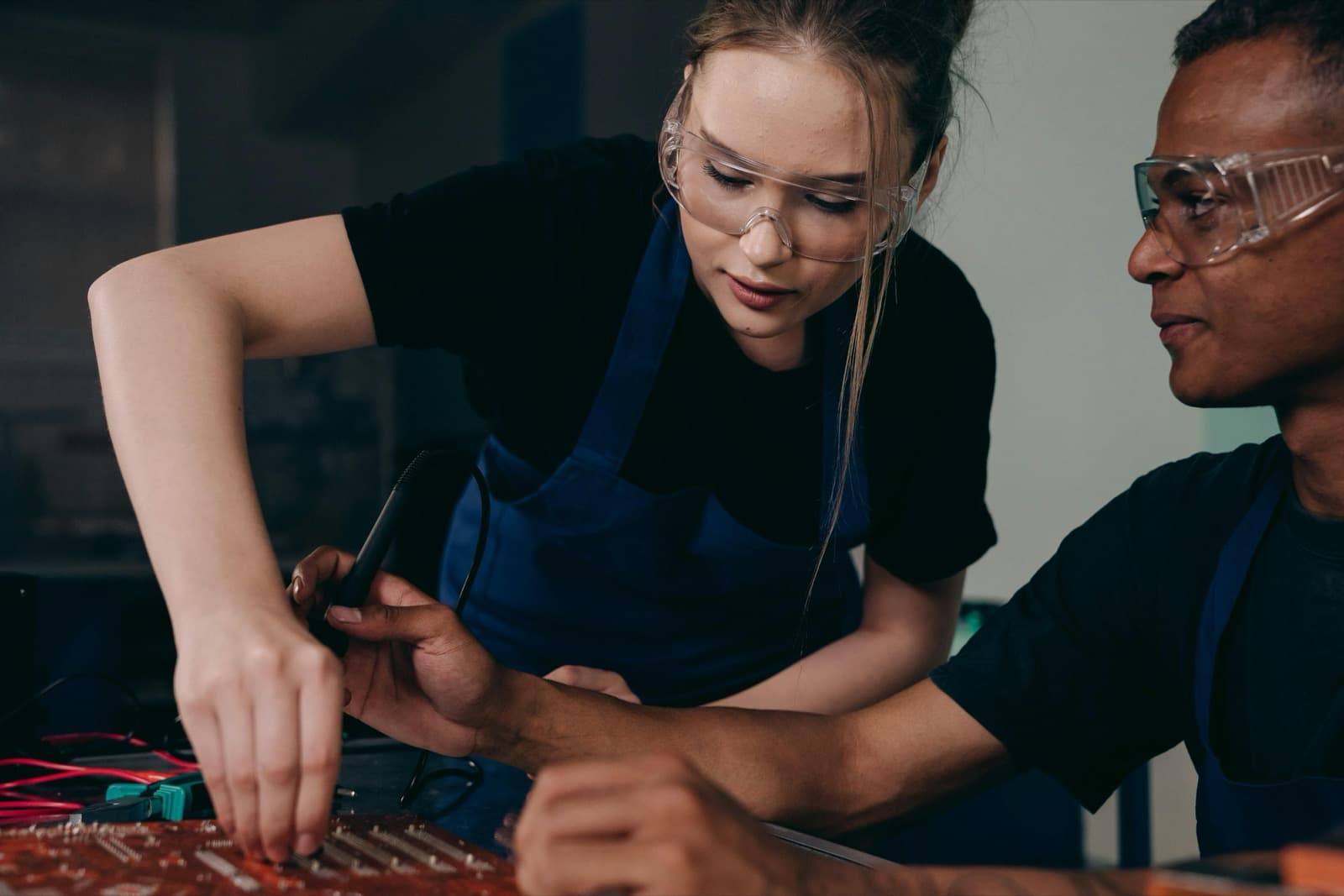 Technician maintaining industrial equipment