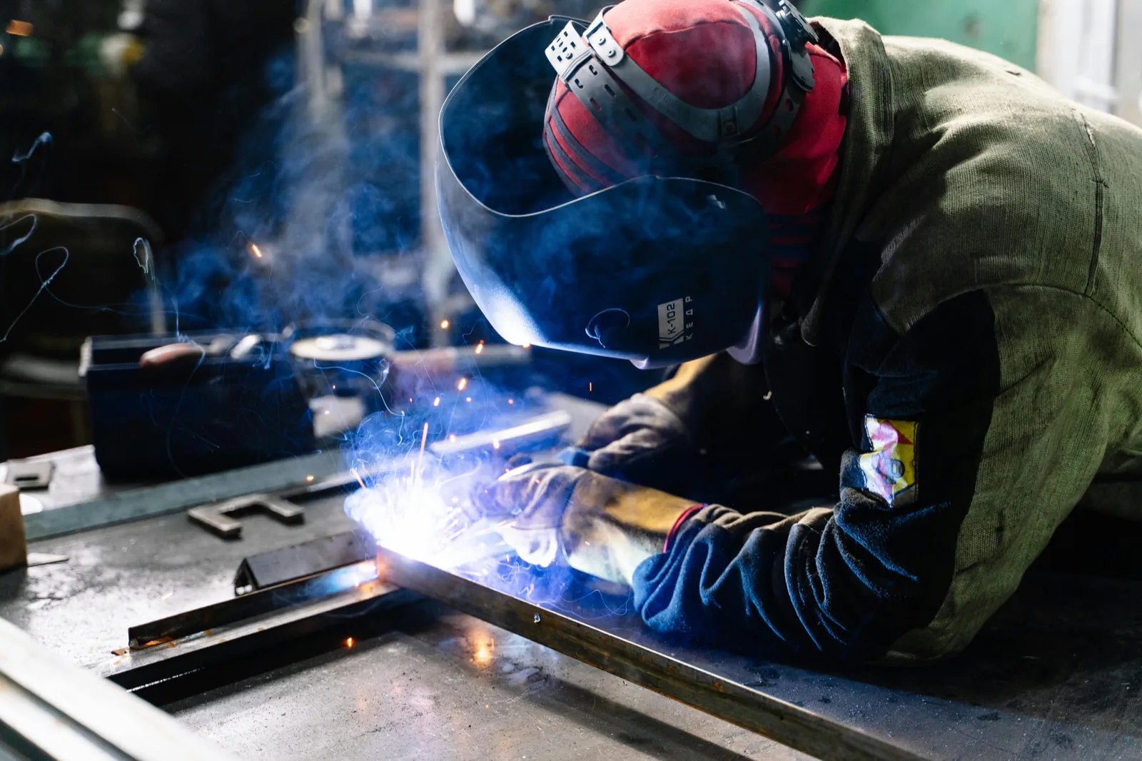 Welder working in a fabrication shop